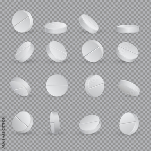 Round white medical pills in different positions.