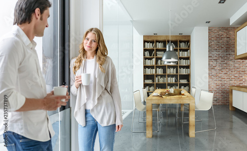 Couple having coffee in a m...