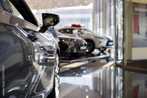 Car auto dealership. New cars at dealer showroom. Prestigious vehicles. © tikhomirovsergey