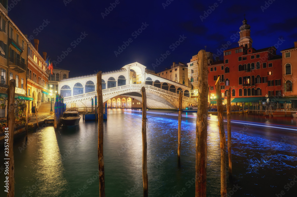 Rialto Bridge and Grand Canal at sunrise in Venice