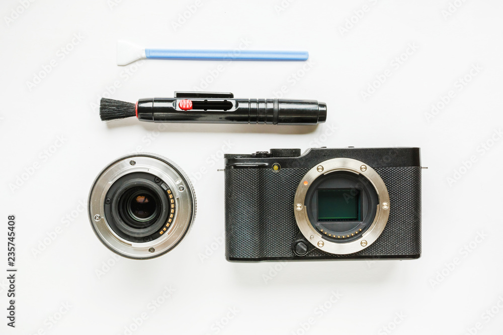 professional tools for digital APS-C dirty camera matrix sensor cleaning on white background