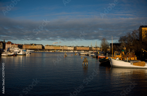 Canvas Print Commuting boats and Old steamboats at Skeppsholmen island in stockholm