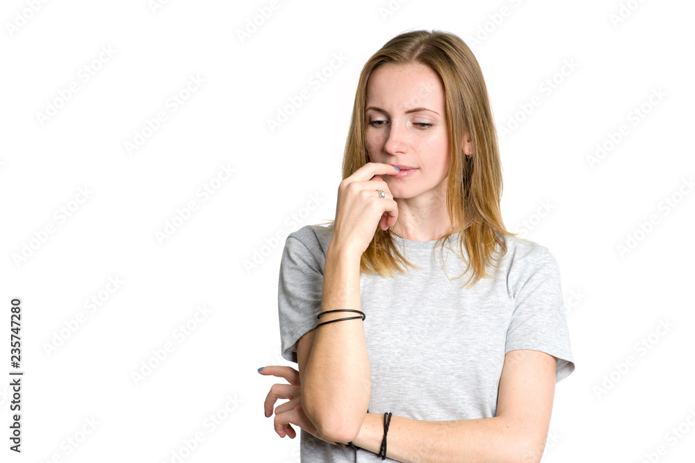 Think about the solution to the problem. Young sad woman isolated on bright background. Young sad woman isolated on bright background. Think about the solution to the problem. Young sad woman isolated on bright background. Young sad woman isolated on bright background.