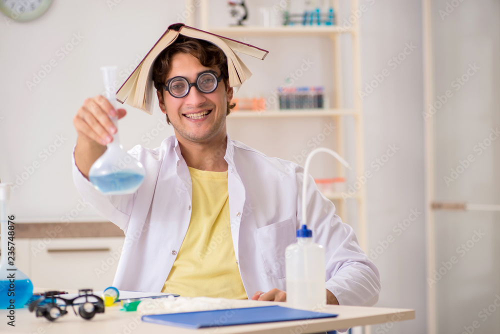 Funny crazy chemist doing experiments and tests Funny crazy chemist doing experiments and tests