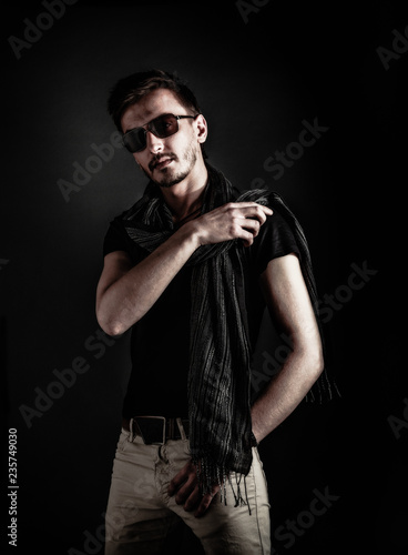 Handsome Young Guy Posing With a hat. Vintage Style Toned Picture