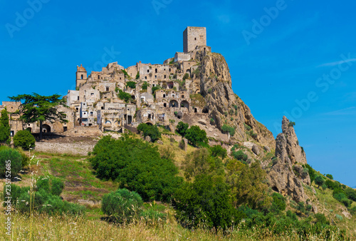 Craco  Italy  - The evocative ruins and landscapes of the ghost town scattered among the badlands hills of the Basilicata region  beside Matera  destroyed by a landslide and abandoned.