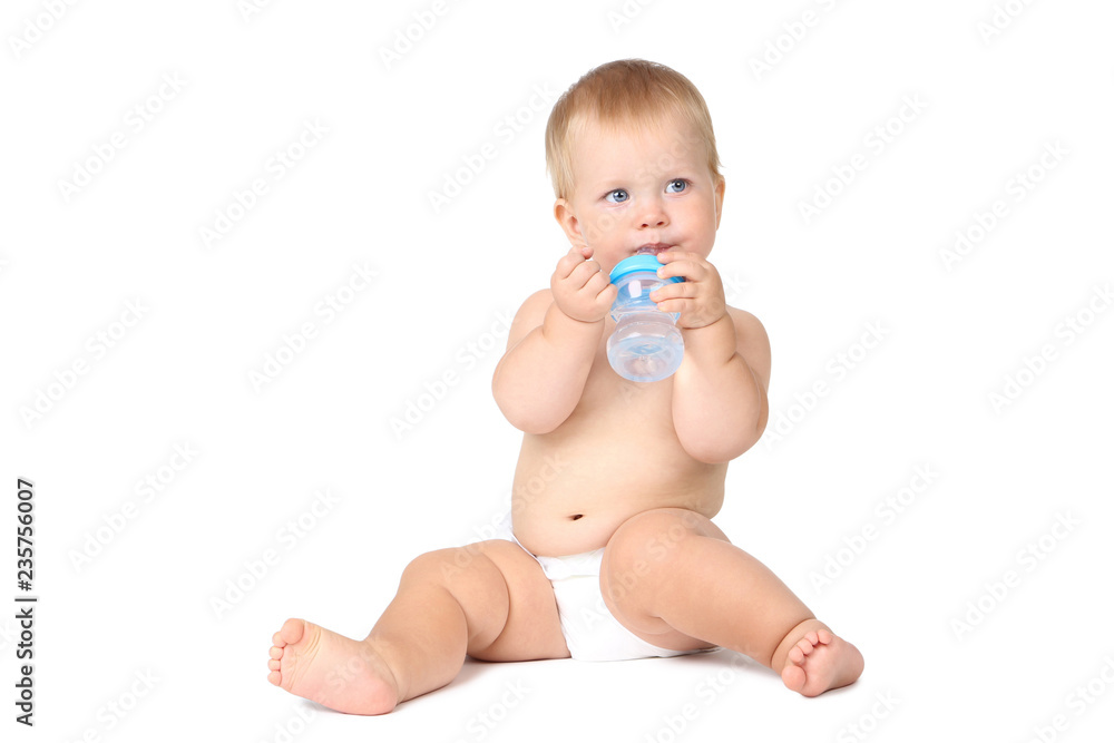 Baby boy drinking water from bottle isolated on white background Baby boy drinking water from bottle isolated on white background