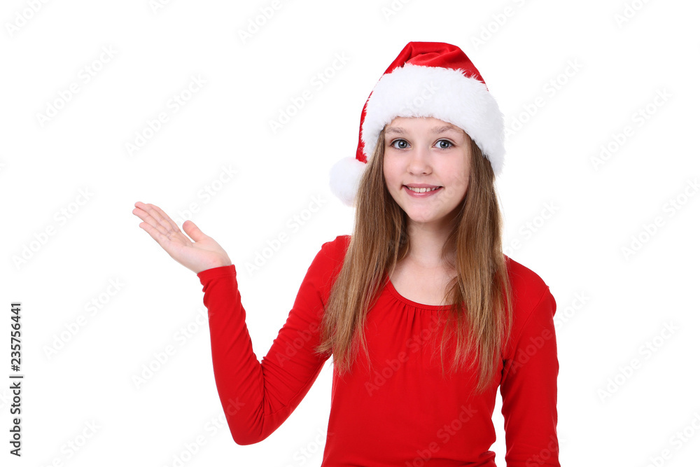 Young girl in santa hat on white background Young girl in santa hat on white background