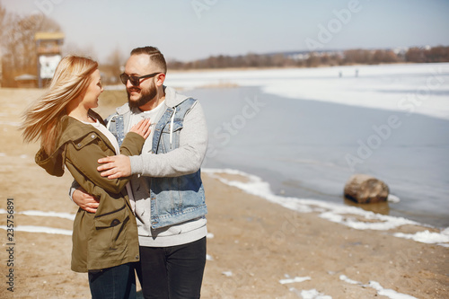 Elegant couple in a winter park