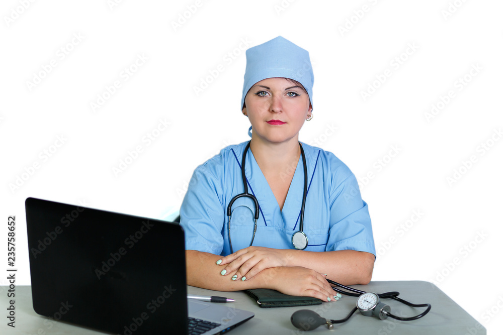 Woman doctor with a stethoscope at the table on a white background. Woman doctor with a stethoscope at the table on a white background.