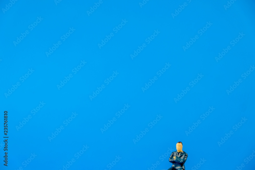 Figure of businessman on blue background. Figure of businessman on blue background.