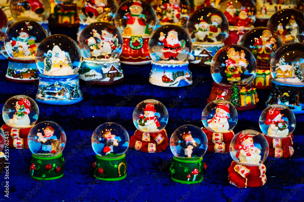 Christmas market kiosk details - snawball with snowman, santa claus and houses