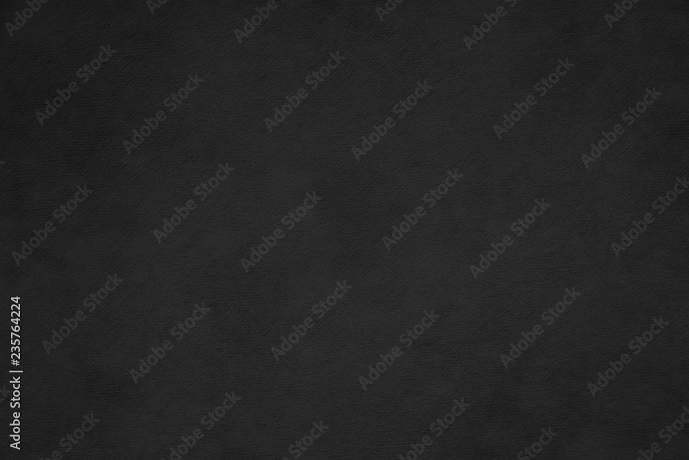 Rugged wrinkled black paper background Rugged wrinkled black paper background
