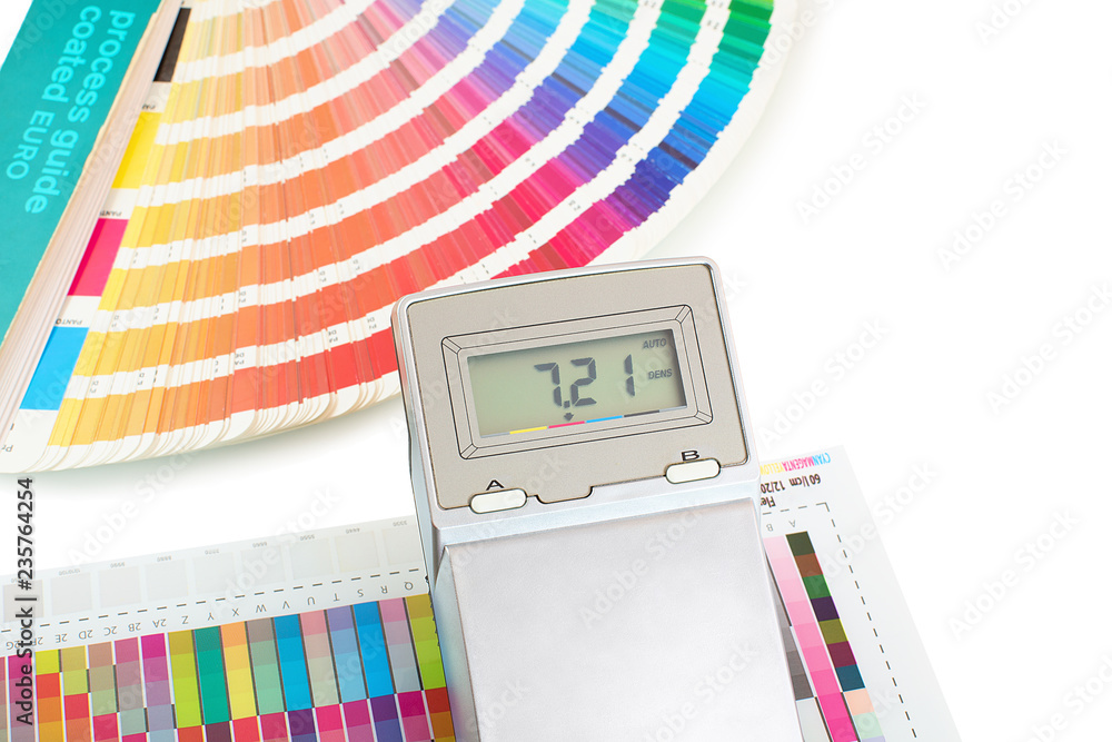 Printed color swatch with density meter and paint guide isolated on