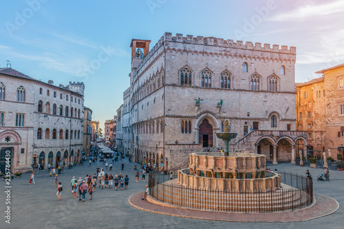 PERUGIA, ITALY - SEPTEMBER 11, 2018: View of the scenic main square (Piazza IV Novembre) and fountain (Fontana Maggiore) masterpiece of medieval architecture in Perugia, Umbria, Italy photo