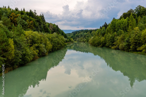 Forest river reflection landscape. Autumn forest river water panorama. Forest river reflection in autumn