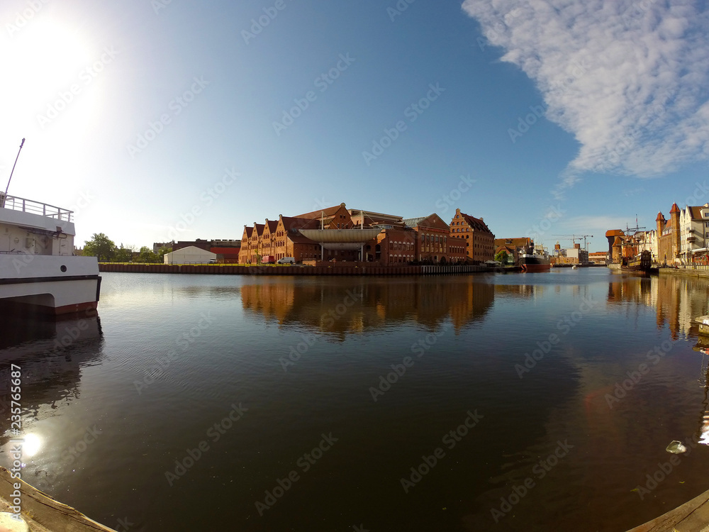 Obraz premium Gdansk at the sunrise. Motlawa river, Polish Baltic Philharmonic.