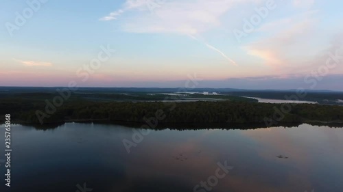 Wallpaper Mural Drone aerial flyover of lake shoreline at sunset Torontodigital.ca
