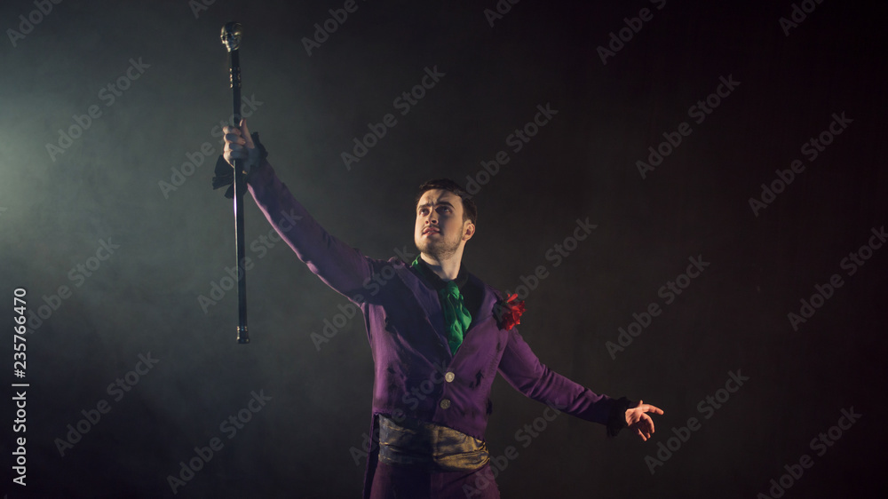 Attention attention, showman shows tricks. guy in the purple camisole and the cylinder. Attention attention, showman shows tricks. guy in the purple camisole and the cylinder.