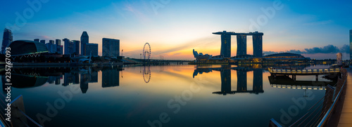 A 180-degree panorama of the Singapore skyline to the east as the blue hour gives hay to dawn. photo