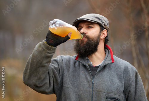 Farmer drinking apple juice
