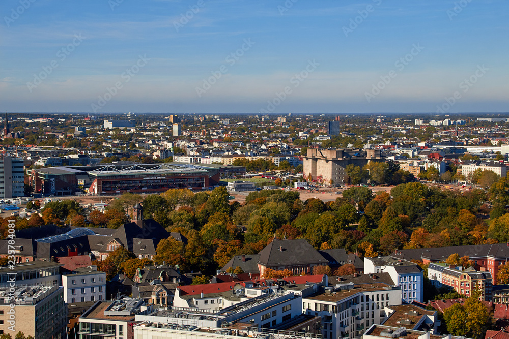 Obraz premium City streets of Germany. Panoramic view of the city of Hamburg from a height. Photo of Hamburg from a height. Cityscape houses and streets.