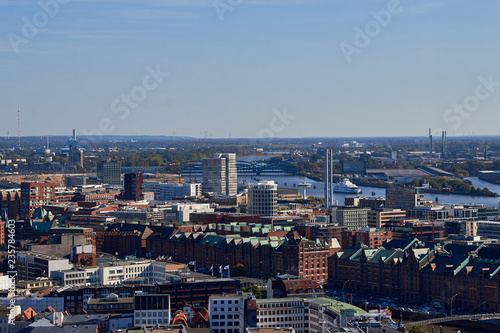 City streets of Germany. Panoramic view of the city of Hamburg from a height. Photo of Hamburg from a height. Cityscape houses and streets. © rtvistlive