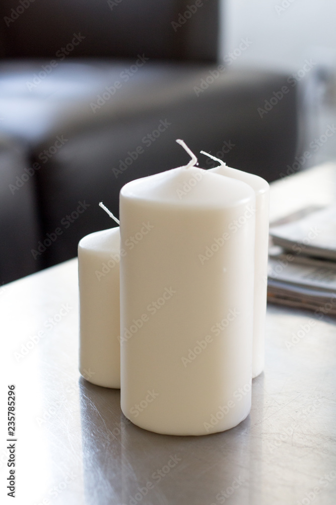 three candles in an office three candles in an office