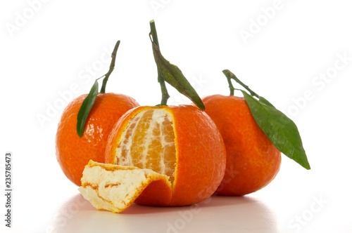 tangerines with leaves isolated on white