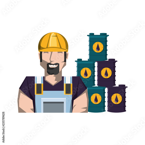 worker with pile barrels of gasoline