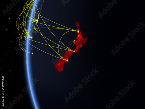 New Zealand from space on model of Earth at night with international network. Concept of digital communication or travel.