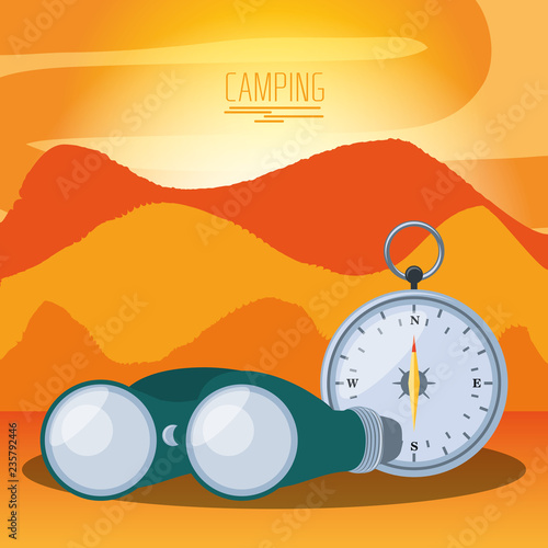 camping zone with binoculars and compass
