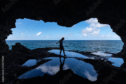 Valerie explores Animal Flower Cave at North Point, Barbados
