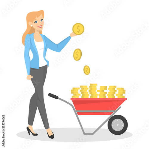 Happy business woman standing with wheelbarrow full of cash