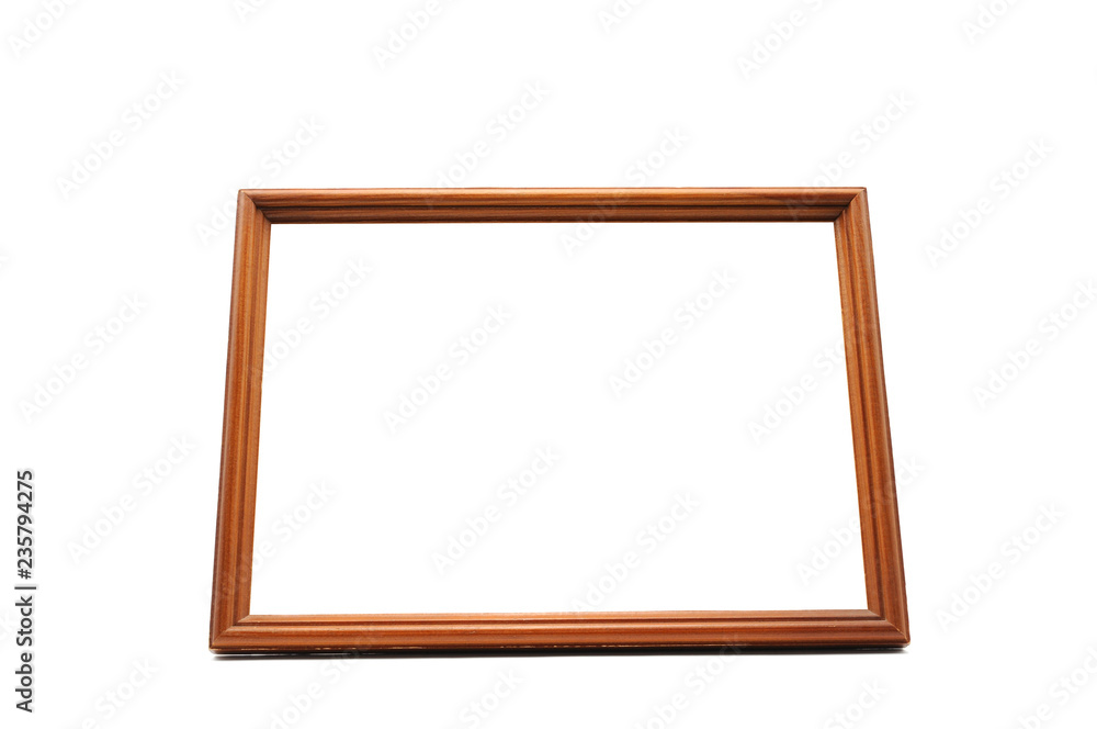 Antique wooden photo frame on an isolated white background Antique wooden photo frame on an isolated white background