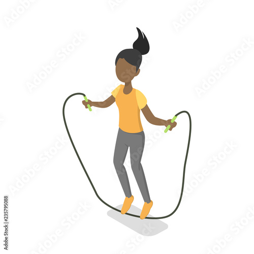 School girl jumping with the skipping rope