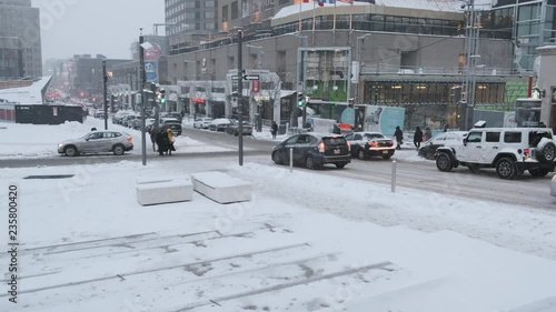 Wide street view of Place Desjardins during the first snowstorm of 2018 photo