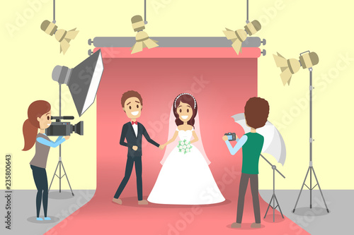 Wedding couple in the photostudio making photoshoot