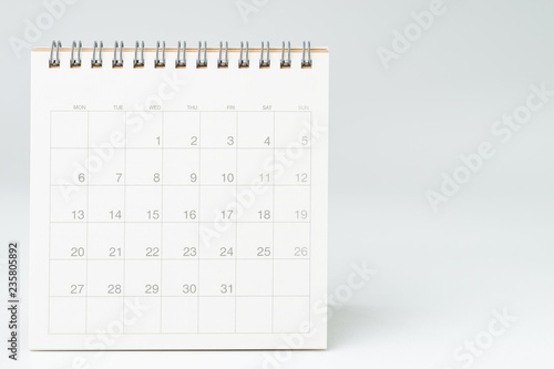 Clean white desktop calendar on white table with copy space, using for schedule appointment or year plan concept