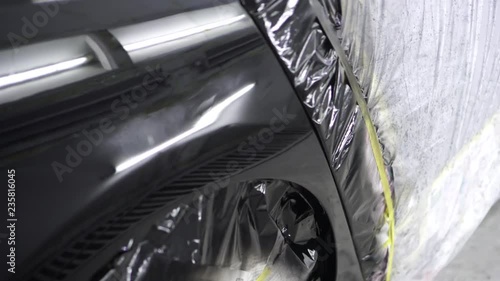 Car body after painting in a cars spray booth.