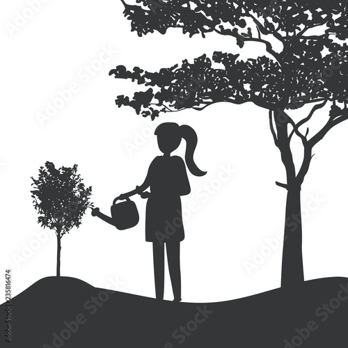 Silhouette of a girl watering a plant vector