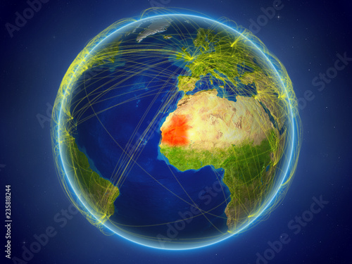 Fototapeta Naklejka Na Ścianę i Meble -  Mauritania from space on planet Earth with digital network representing international communication, technology and travel.