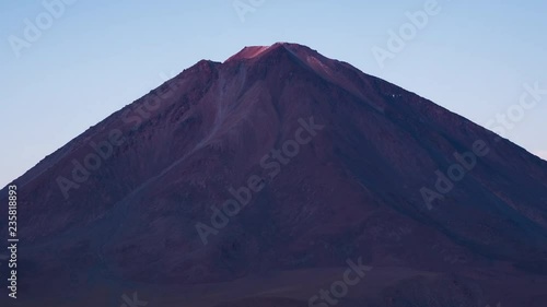 Zoom out timelapse of the volcano of Licancabur during sunrise in Sur Lipez Province of Bolivia DF photo