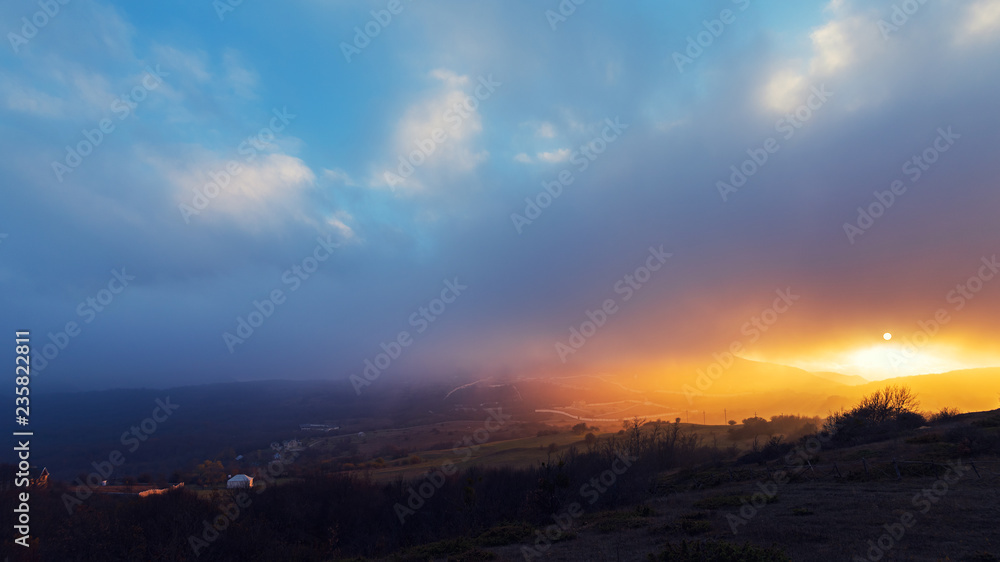 Amazing beautiful and colorful sunset in the mountains Amazing beautiful and colorful sunset in the mountains