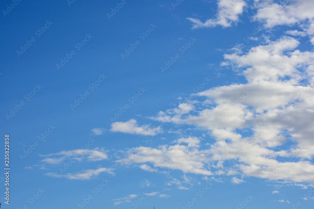 blue sky with clouds on the right background blue sky with clouds on the right background