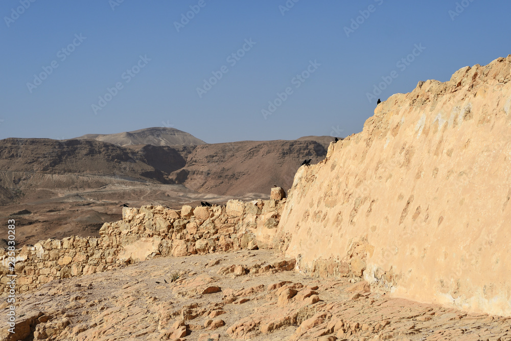 Masada fortress, ancient fortification in Israel situated on top of an isolated rock plateau Masada fortress, ancient fortification in Israel situated on top of an isolated rock plateau