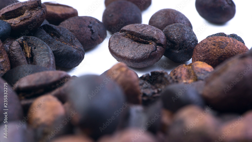 Coffee beans closeup with selective focus and crop fragment Coffee beans closeup with selective focus and crop fragment
