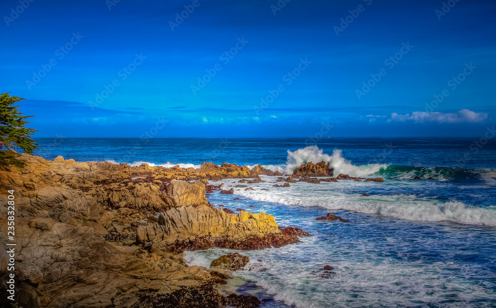 Pacific Ocean waves crashing on the rugged Northern California coastline in Monterey Pacific Ocean waves crashing on the rugged Northern California coastline in Monterey