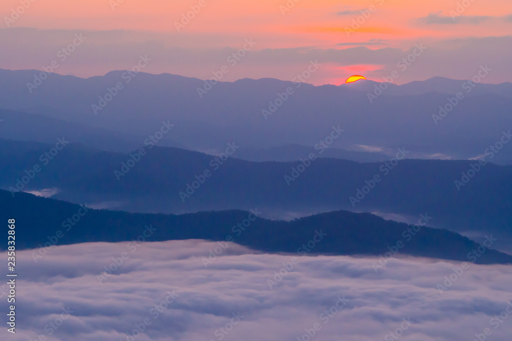  sunset overlooking mountains with Mist