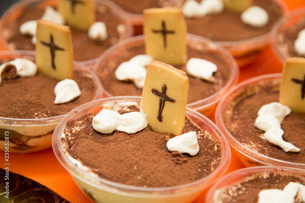 horizontal image with detail of chocolate sweets with cookies prepared for halloween party horizontal image with detail of chocolate sweets with cookies prepared for halloween party